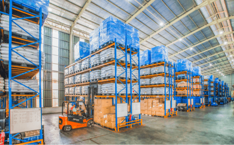 forklift inside large warehouse