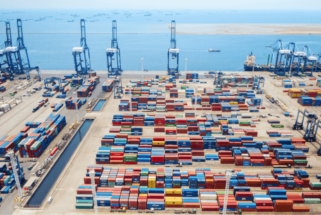 port with containers, cargo ship and container cranes